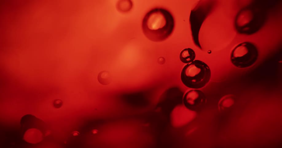 Bubbles in a red liquid