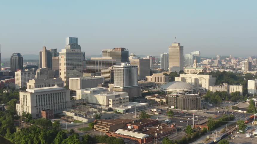An aerial view of buildings and skyscrapers in a large city