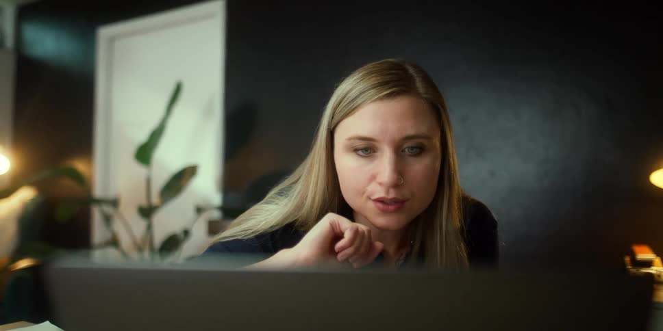 Woman talking to computer