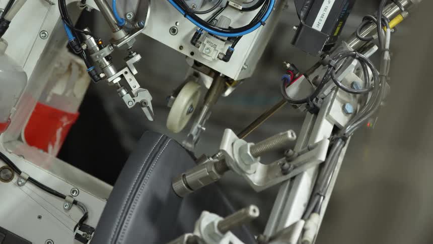 Robotic arm stitching
