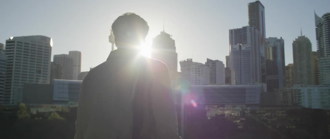 A man looking over a city