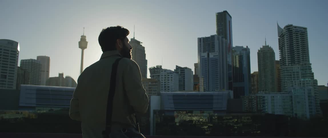 A photographer looking at a city
