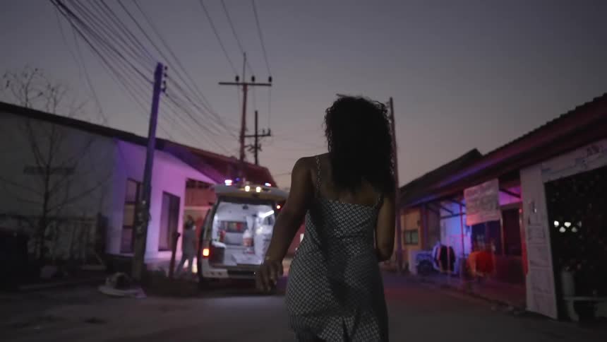 A woman is running down the street