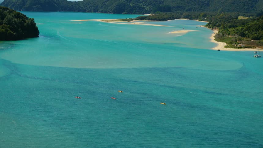 Boats are traveling across the water