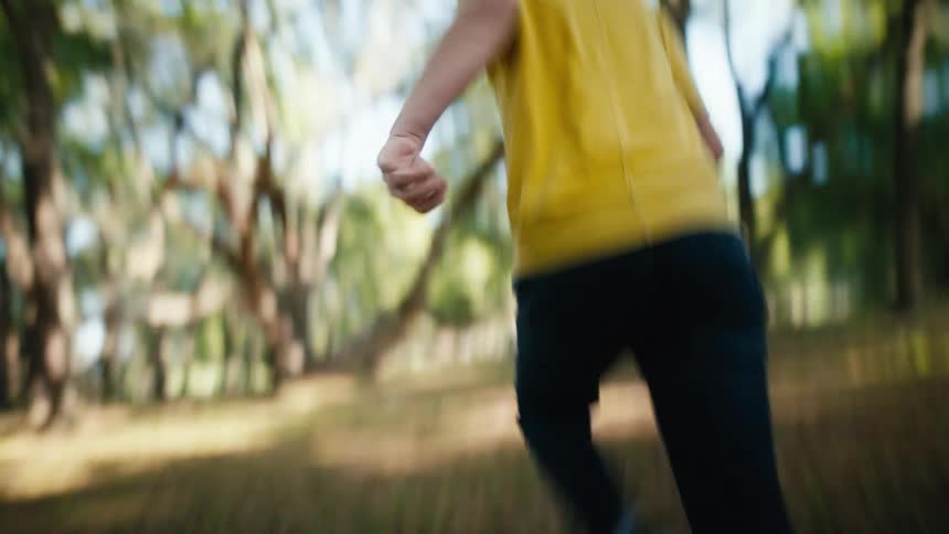 A child running outdoors in a park