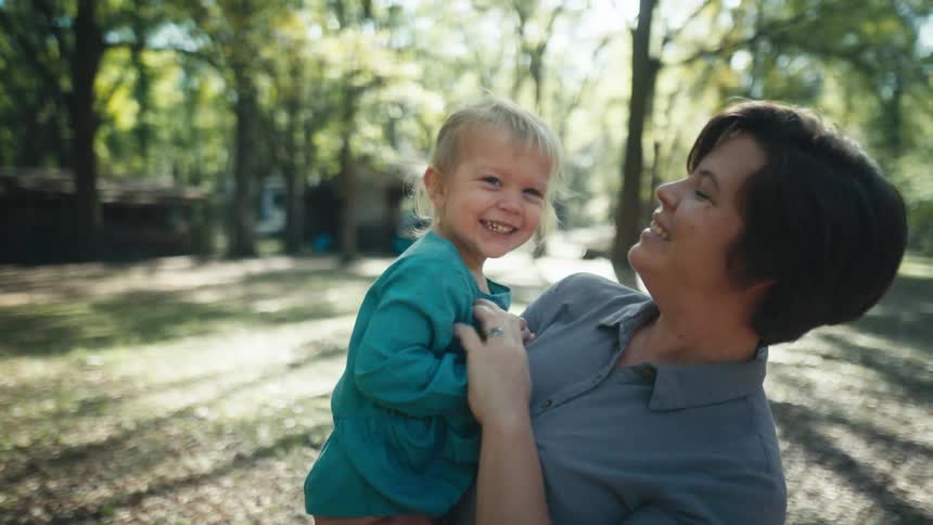 Woman holding child