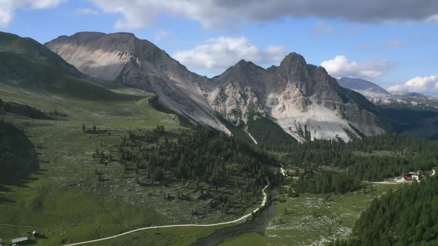 An aerial view of a mountain range and valley