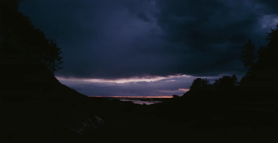 A time lapse of a landscape going dark
