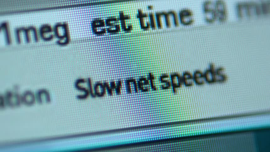 A time estimate message is flashing on a computer screen