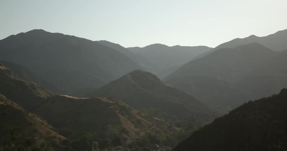 Fog covers the mountains ahead