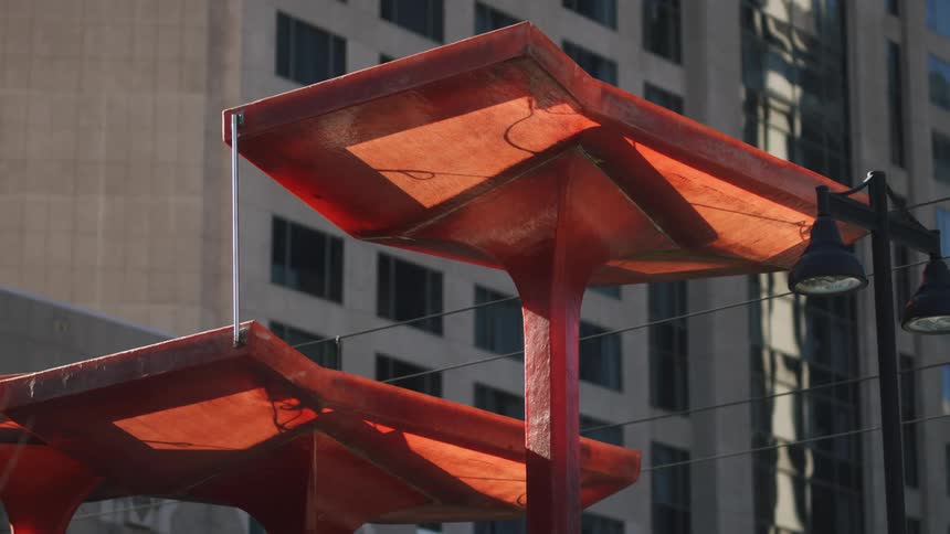 A view of some poles outdoors in a city