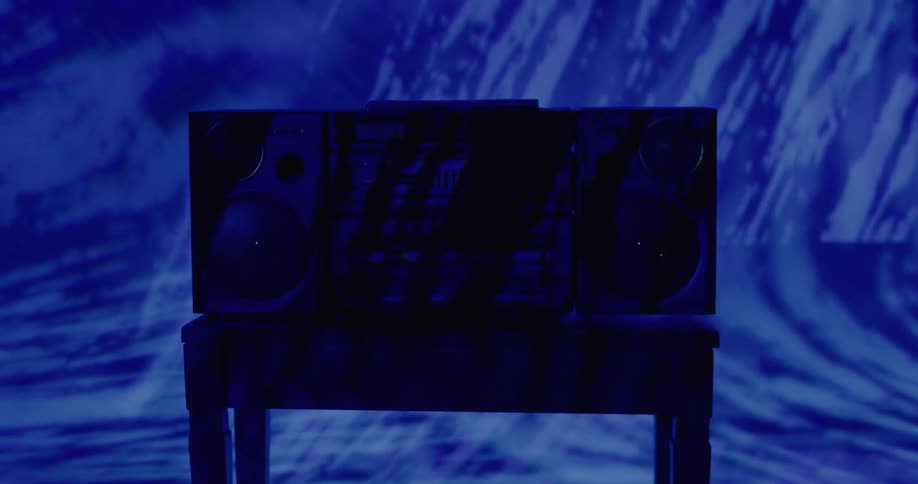 A retro radio bathed in blue light