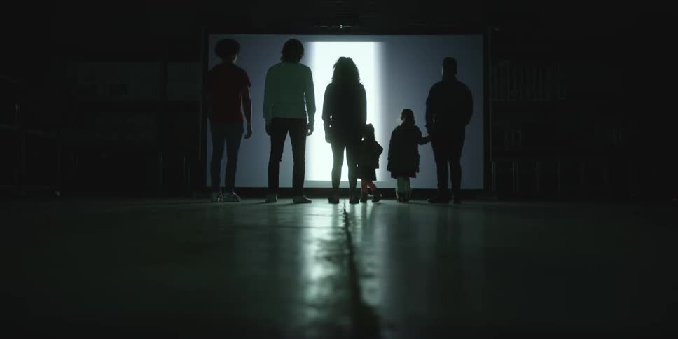 Family walking in room