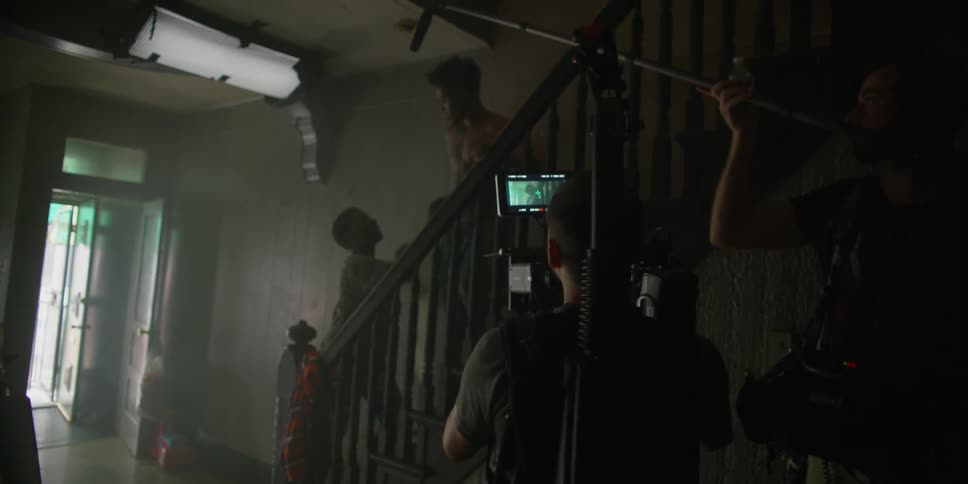 A man and women have an argument while being filmed