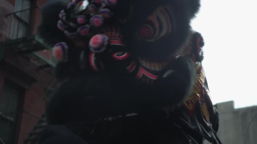 Dragon dance during chinese new year in new york chinatown