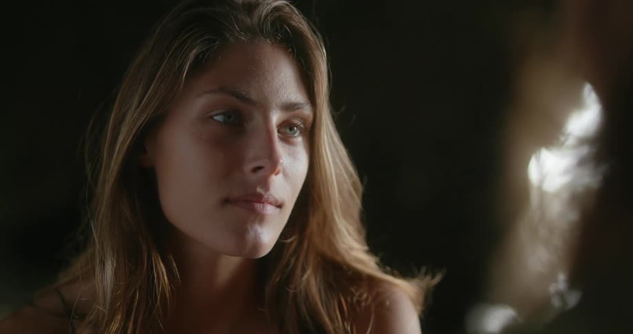 A portrait of a woman looking into the distance