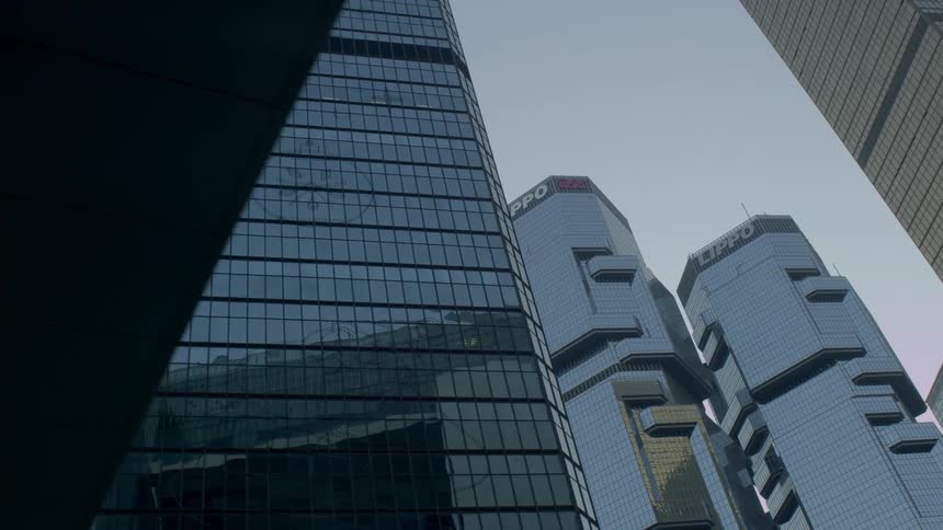 A downtown area is filled with a number of very tall skyscrapers