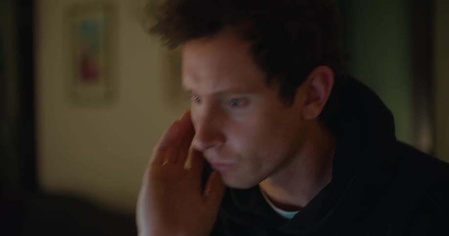 A man is looking at a display