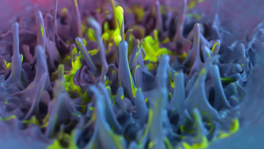 Colorful paint jumps up and subsides with vibration