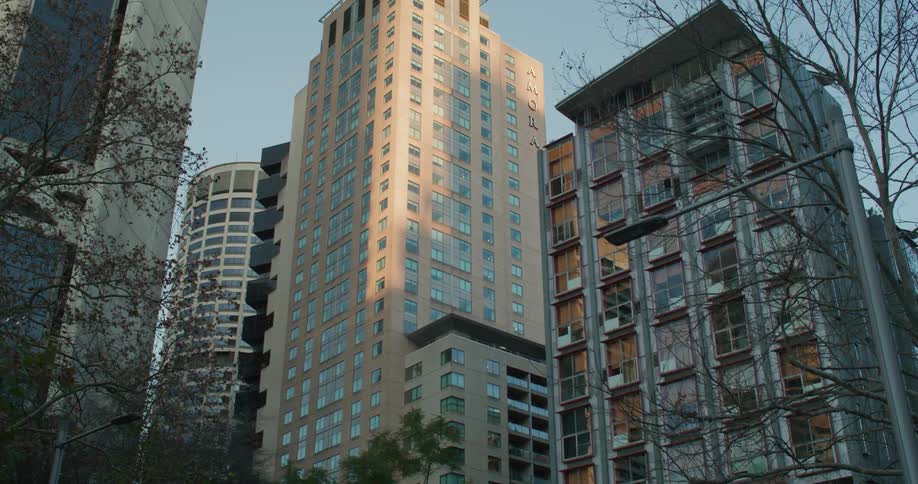 Tall apartment buildings in a city on a clear day
