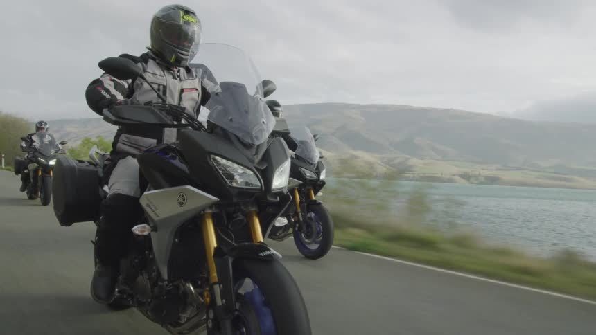 Motorbikes driving on a road