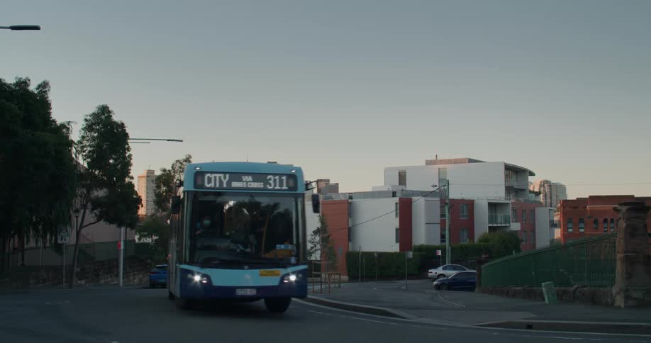 A bus driving down a road