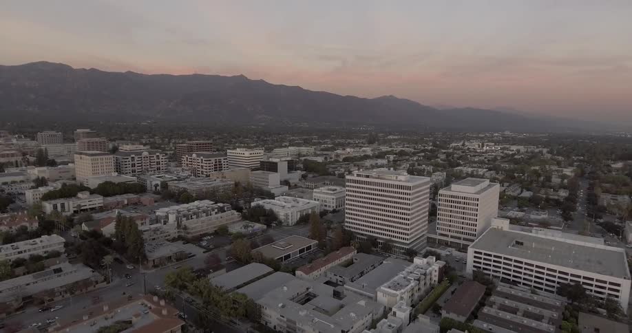 A city with a mountain in the distance