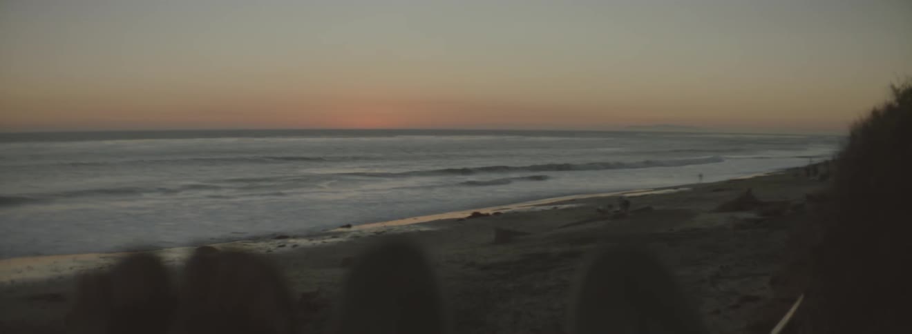 An empty beach at sunset