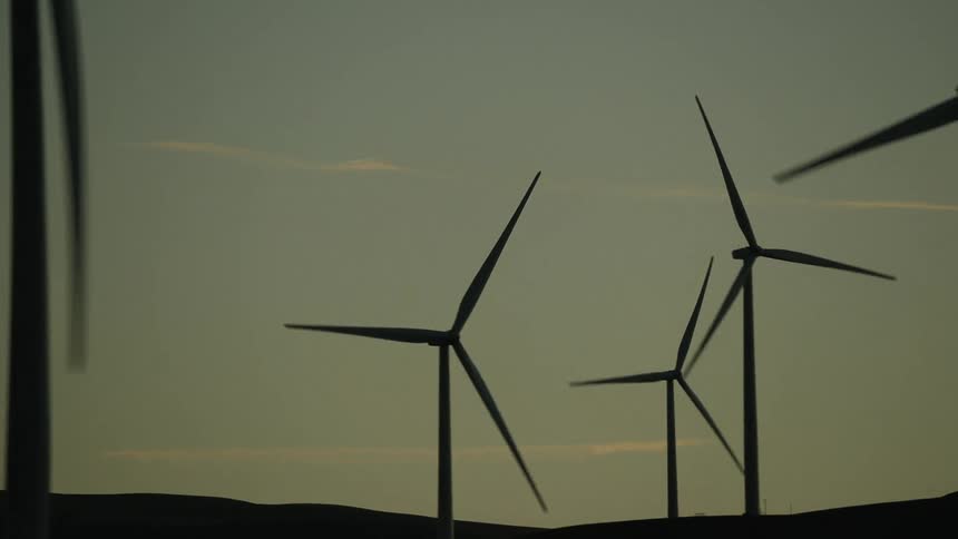 Turbines spinning on a wind farm