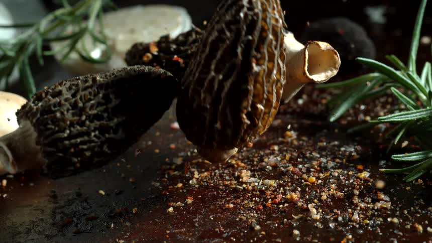 Mushrooms are dropped on the table