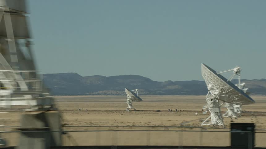 Several satellite dishes in a remote area