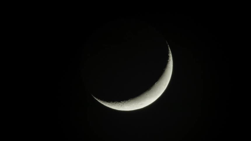 Crescent moon in the night sky