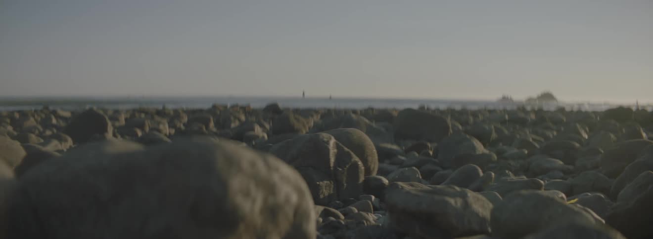 Close up of many rocks by the shore