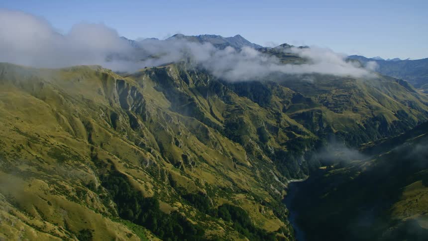 Mountain ridge high in the clouds
