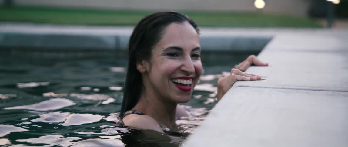 A woman swimming in a pool