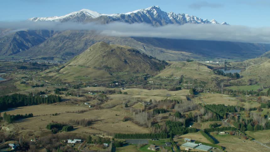 Aerial shot of a rural area with mountains