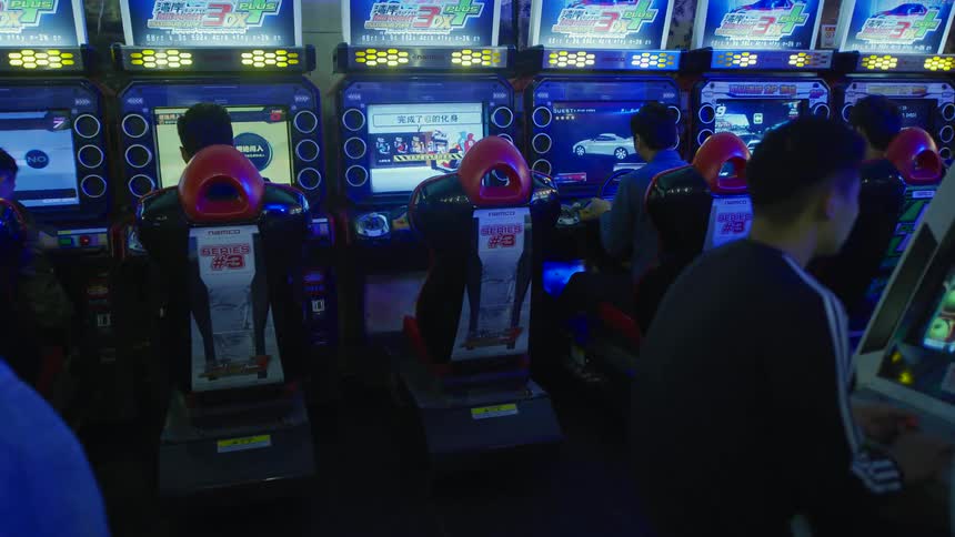 Game center arcade with kids playing games