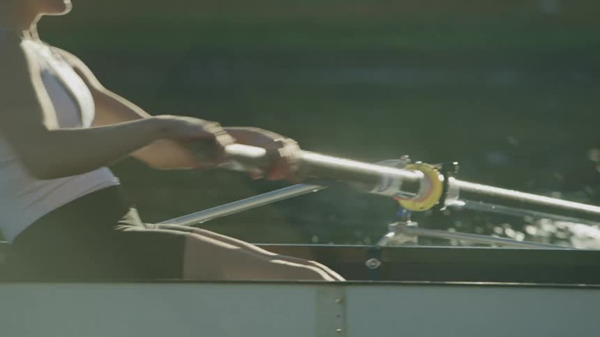 Women rowing a boat professionally