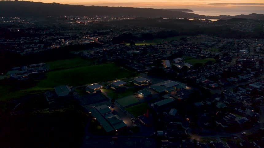 The sun is setting on the town