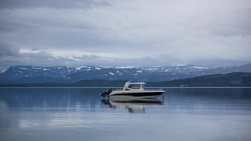 Time lapse of boat anchored in the ocean