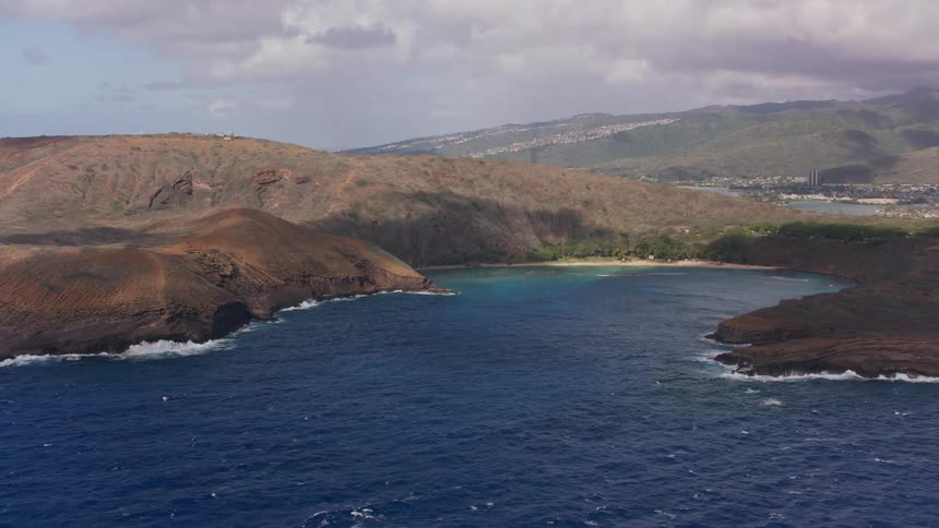 Aerial view of hills overlooking bay