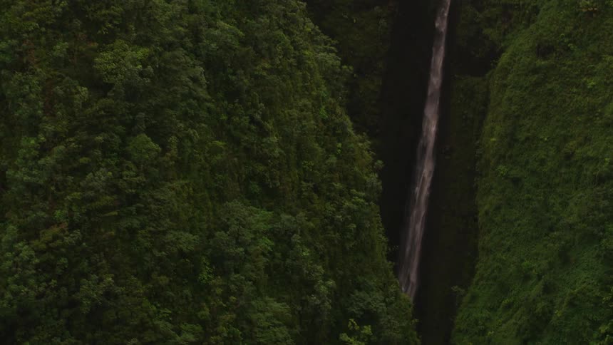 The waterfall is falling off the cliff