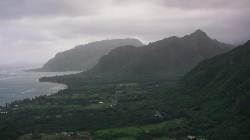 Homes sit on vast properties below cliffs along the coast