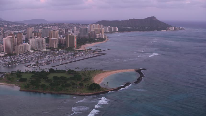 Aerial view of the tall skyscrapers on the waterfront city skiline near the ocean