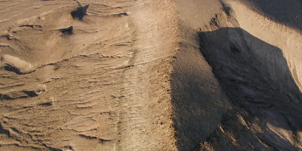 An aerial view of sand in a dessert