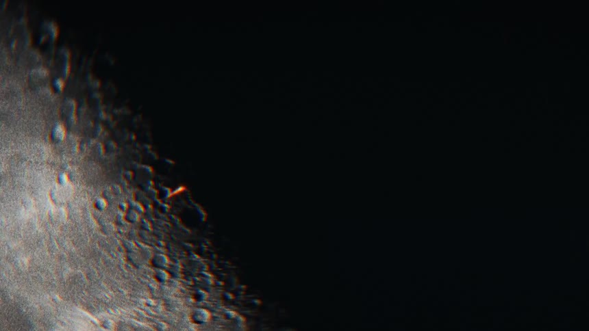 A meteorite flying in the sky with the moon in the background