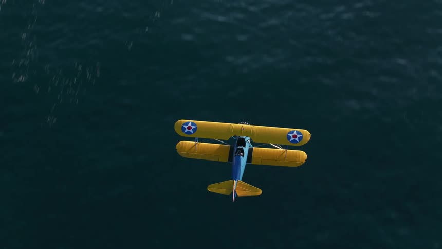 A plane flies over the ocean
