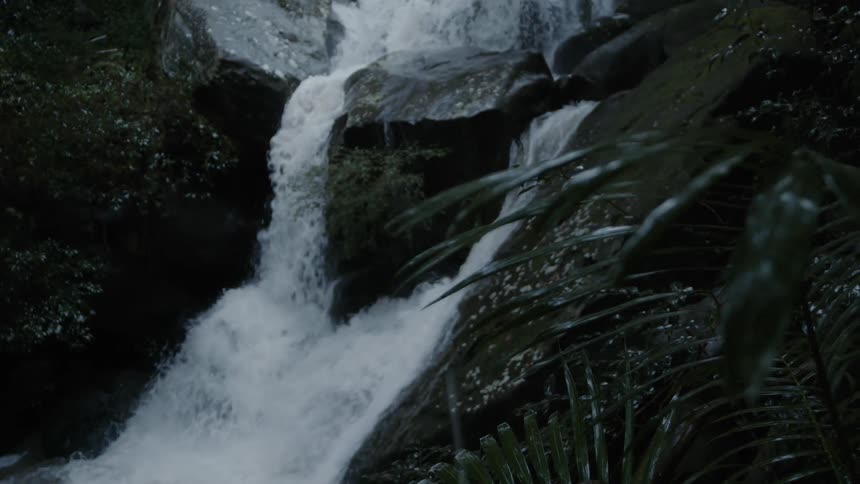 Waterfall surrounded by rocks