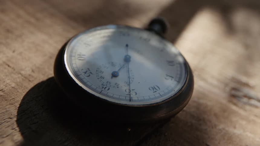 The stop watch is counting on the table
