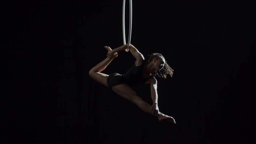 Person spinning on hoop